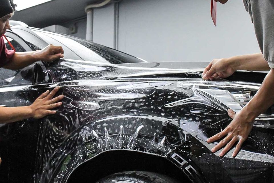 AutoSPA premium paint protection film applied over a car body